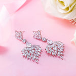 Load image into Gallery viewer, Vail Design CZ Dangle Earrings, Finest Quality Pear, Marquise, and Round Cut AAA Cubic Zirconia Dangle Earrings
