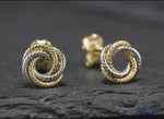 Load and play video in Gallery viewer, 14K Multi Color Gold Knot Stud Earrings
