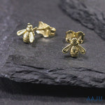 Load and play video in Gallery viewer, 14K Yellow Gold Honey Bee Stud Earrings, Gold Bee Studs, Dainty Bee Studs, Tiny Bee Studs, Bumble bee Studs, Solid Gold Studs
