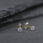 Load and play video in Gallery viewer, 14K Solid Yellow Gold CZ Studs for Women, Hypoallergenic Studs, Luxury Studs, Cz Gold Studs
